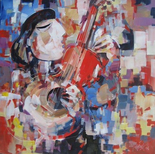Woman with a string instrument amid colourful blocks