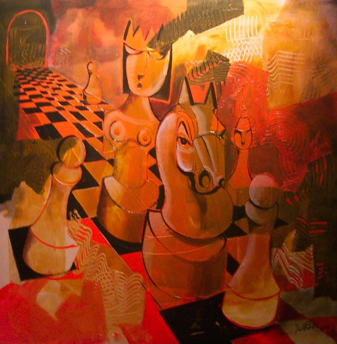 Golden queen-like figure beside chess pieces