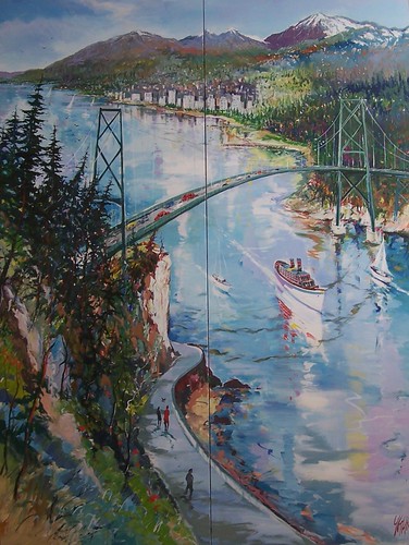 Suspension bridge above a wooded shoreline