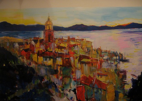 Coastal town overlooking a violet sea