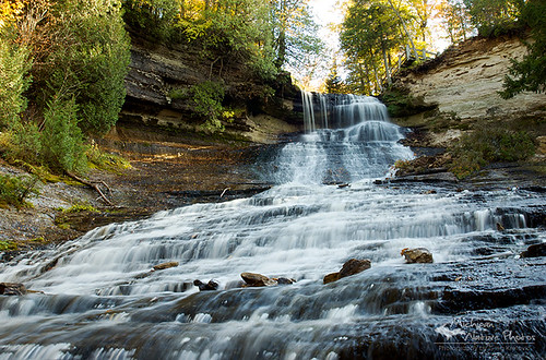 autumn trees fall water yellow waterfall rocks michigan seasonal flowing upperpeninsula