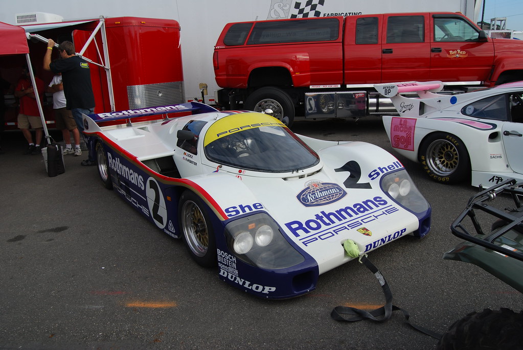 Image of Porsche 956/962 Group C endurance racer towed in by an ATV...