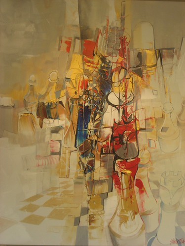 Small chess composition against pale golden paint