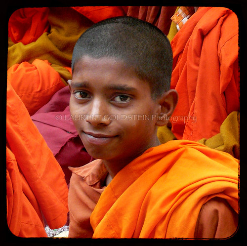 boy portrait people orange india smile childhood youth square colours peace child emotion expression buddhist faith prayer atmosphere happiness monk buddhism serenity soul devotion spiritual shanti dharma bihar bodhgaya भारत indiasong earthasia