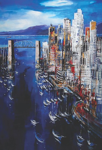 Vancouver buildings and bridge beside blue water