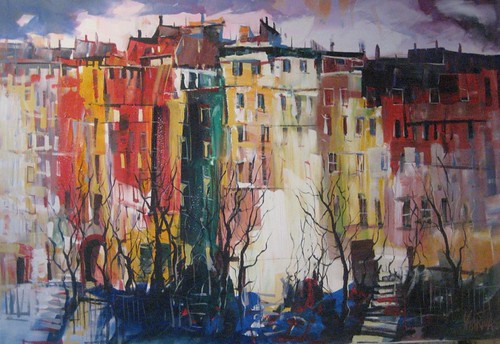 Colourful buildings reflected in water
