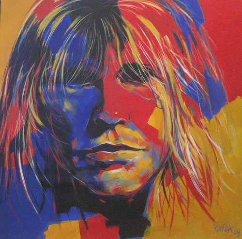 Long-haired musician portrait in blue, orange and yellow