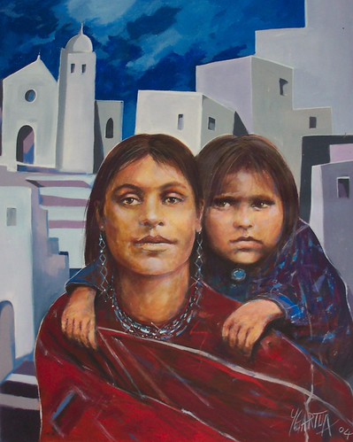 Two children before white buildings