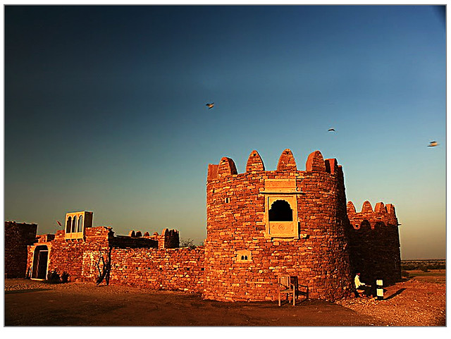 The Khaba Fort near the Rawla Sand dunes in Jaisalmer stands tall and beautiful