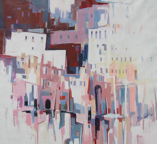 Pale block-like buildings with pink and brown shadows