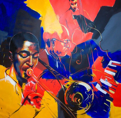 Musician and instruments in saturated blue and orange