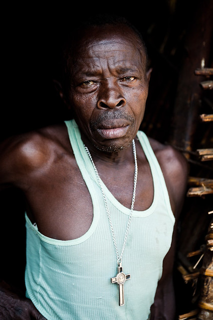 Dipslaced man at the doorstep of his hut - DR CONGO -