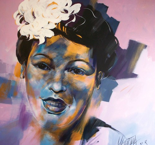 Smiling singer with flowers in her hair