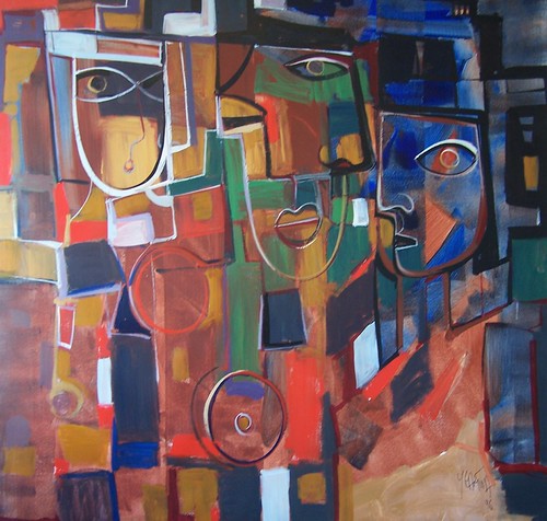 Overlapping angular faces in red, green and blue