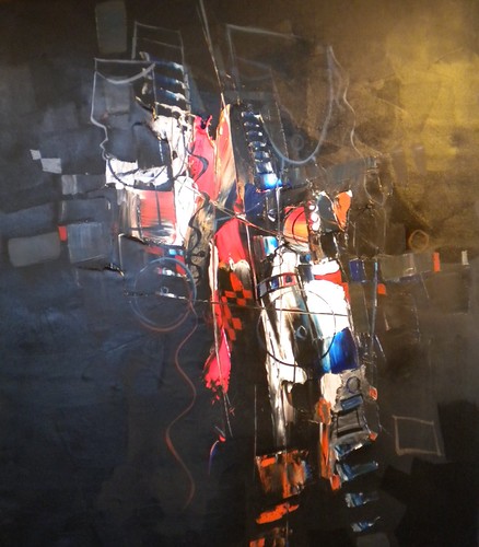 Small fragmented figure on a dark background