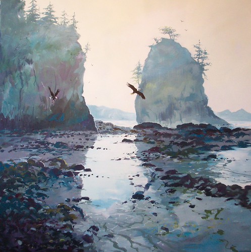 Rock formations beside a quiet coastal inlet