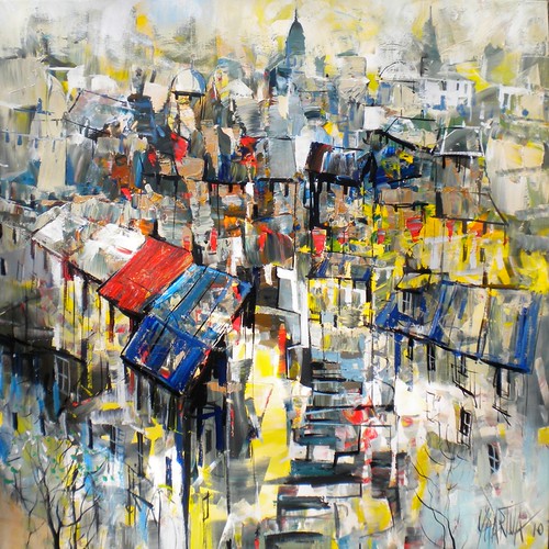 Dense rooftops and towers in white and yellow