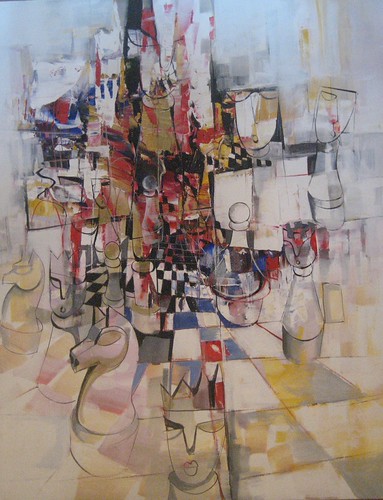 Pale chess figures with red and black details