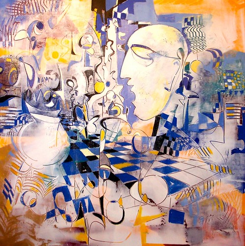 Pale faces above a chequered arrangement of colour