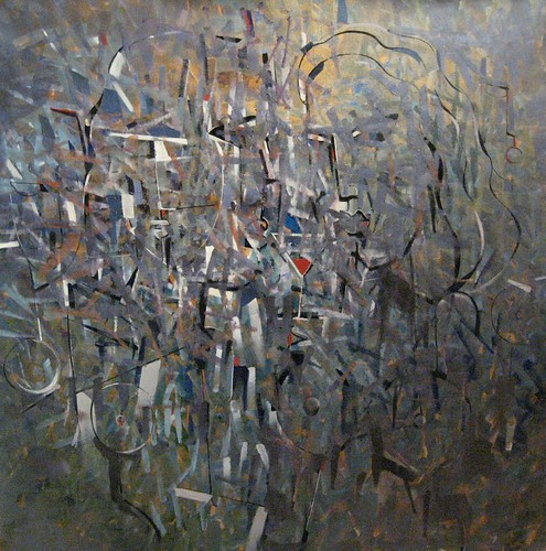 Overlapping small forms in muted grey and brown