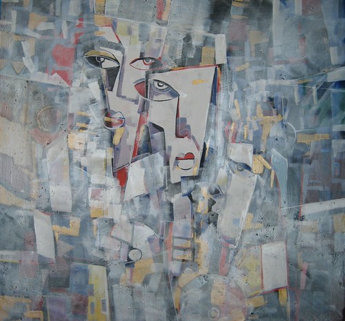 Pale angular face among white and blue-grey blocks