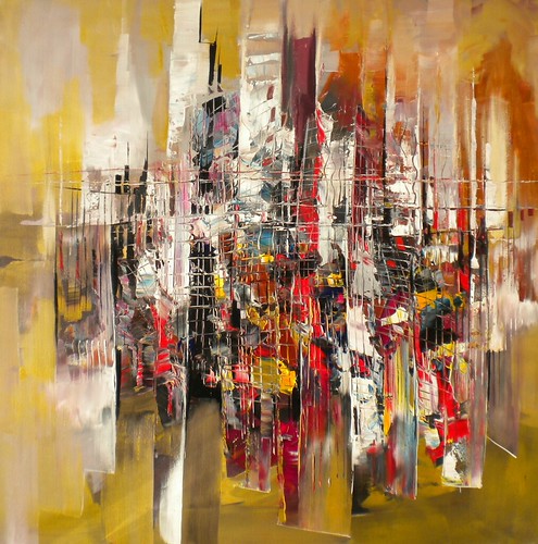 Golden abstract city towers with red accents