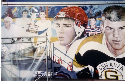 Hockey players painted across an exterior wall