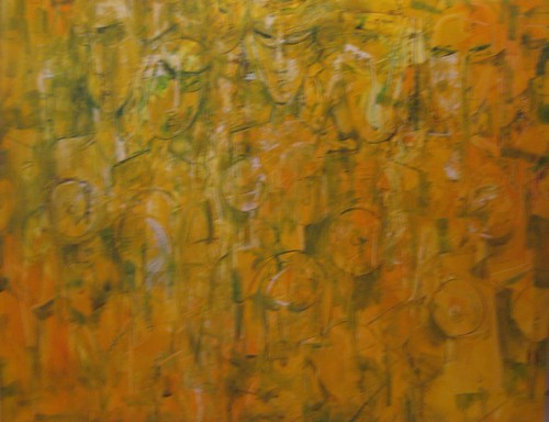 Faint figures within golden textured paint