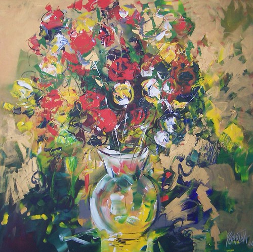 Flowers in a rounded vase with curling leaves