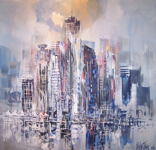 Pale city towers reflected in a harbour