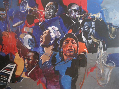 Musician ensemble with saxophones and keyboard