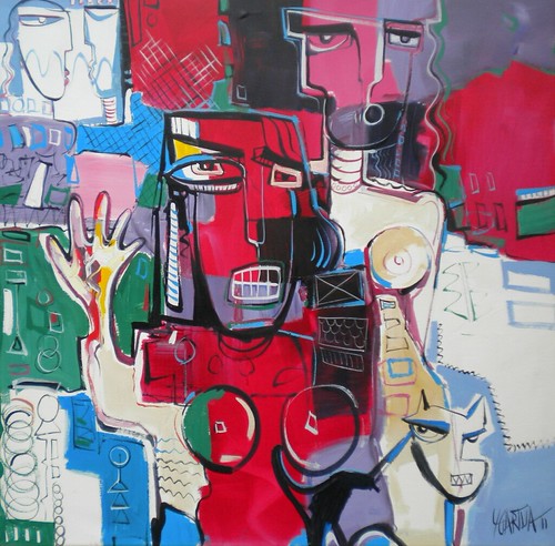 Large red and black face amid small colourful shapes
