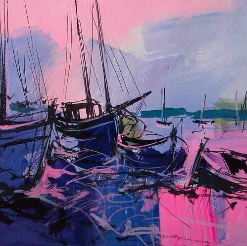Boats and dark rigging on pink and blue water