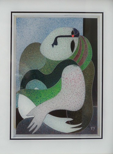 Rounded green and white female figure
