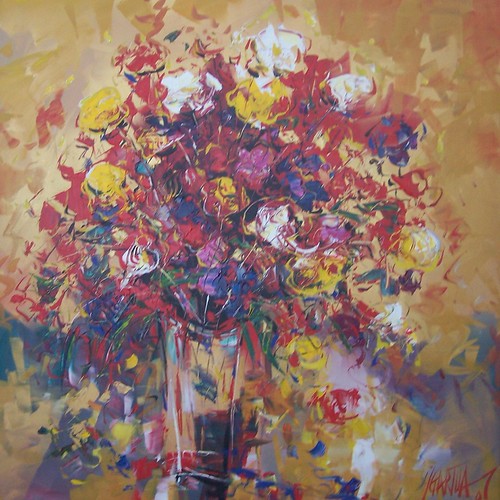 Mixed spring bouquet against warm ochre