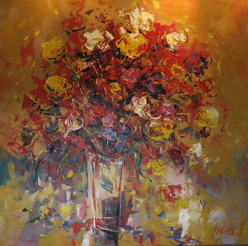 Soft red and gold floral arrangement