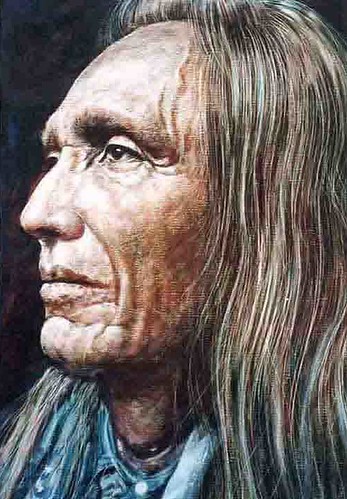 Long-haired man shown in profile
