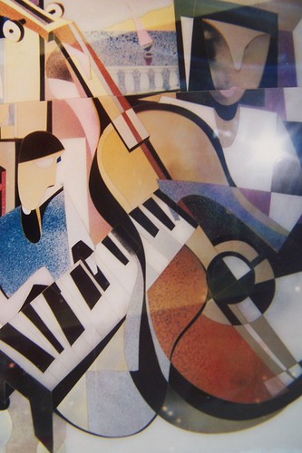 Angular guitarist with a keyboard and strings