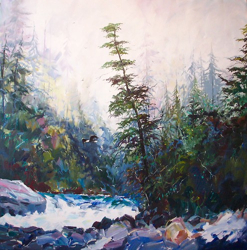 Forest stream beneath pale misty light