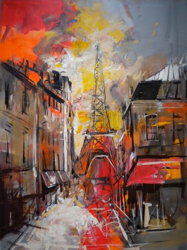 Red tower framed by dark street buildings