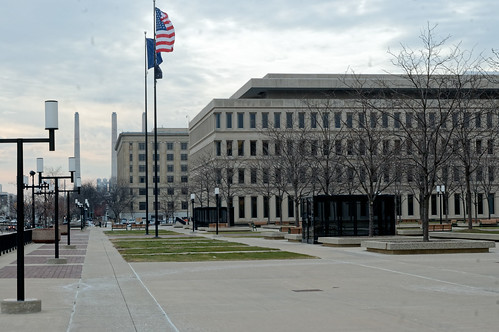 sidewalk building office lansing capitolcomplex government winter 1159 february flag sky cloud michigan nikon d70 2006 nikond70 onthisdate 32366