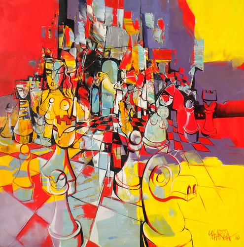 Colourful figures and pieces above a red and yellow board