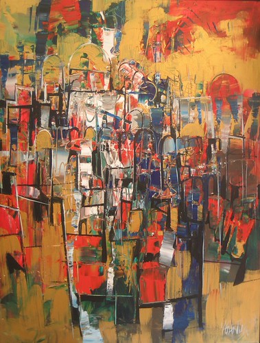Dense abstract buildings in orange, red and green