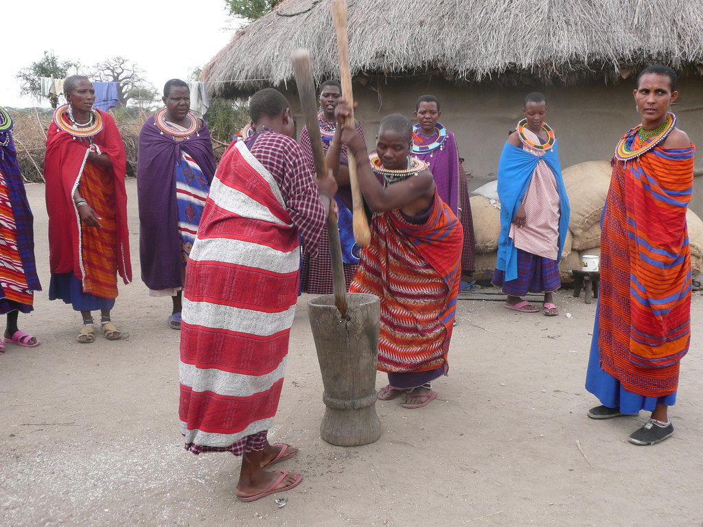 Tanzania, Serengetti, Maasai Village, Women's Work Is Never Done by Mary Warren 20.8 Million Views