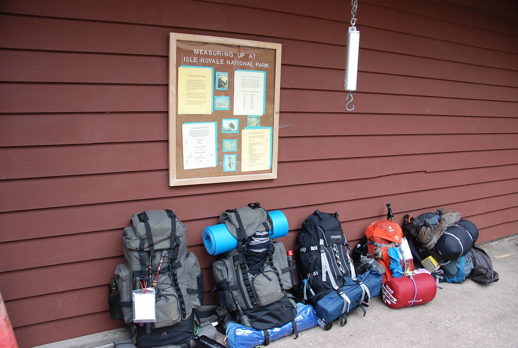Backpacks lined up at the camp store. Rock Harbor, Isle Ro… | Flickr