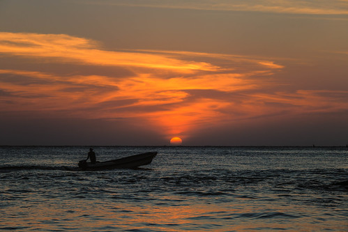 sunset dusk evening sky clouds sea ocean caribbean cartagena colombia waves reflections boat silhouette landscape seascape