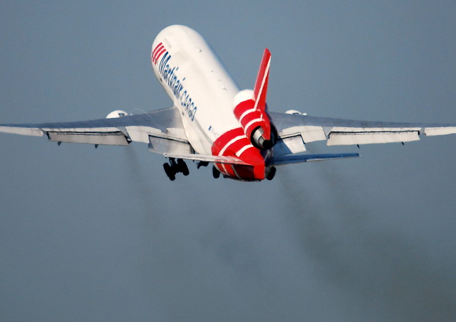 Smokey departure: Martinair Cargo McDonnell Douglas MD11 (PH-MCT) departing from Schiphol