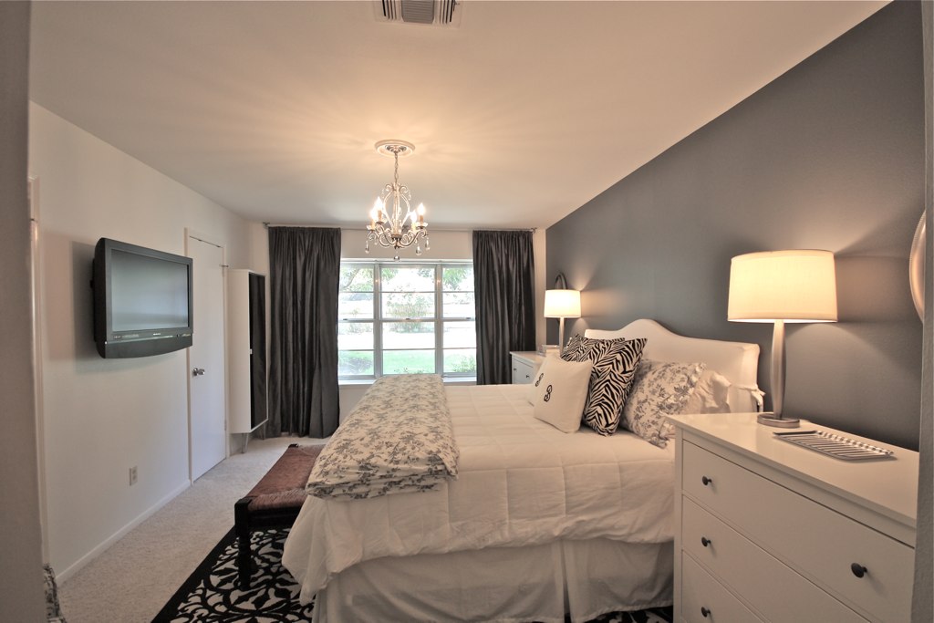 White Master Bedroom with Black Accent colors