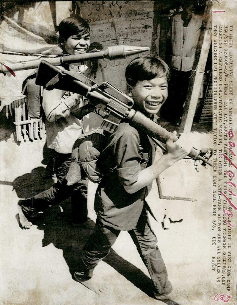 1973 - Two teenage Viet Cong soldiers at camp near Cai Lay, one ...