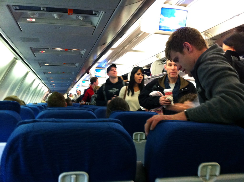 Airplane seating | Passengers boarding an airplane from insi… | Flickr